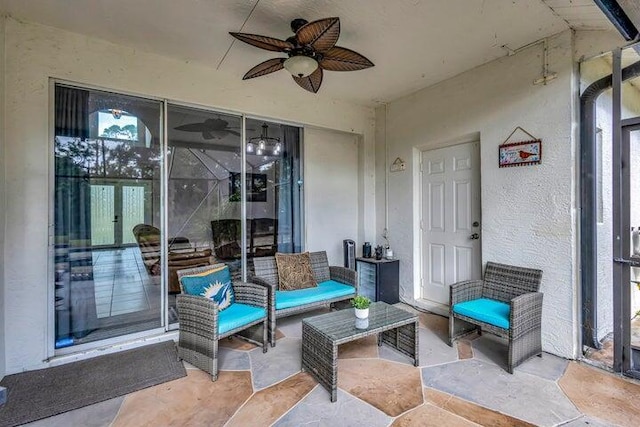 view of patio / terrace featuring ceiling fan and an outdoor living space