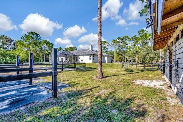 view of yard with an outdoor structure