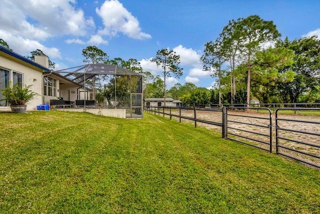 view of yard featuring a lanai