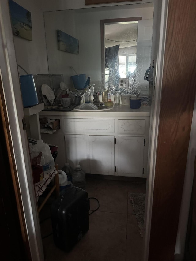 bathroom with vanity and tile patterned floors