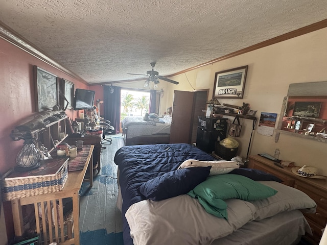 bedroom with ceiling fan, a textured ceiling, wood-type flooring, and ornamental molding