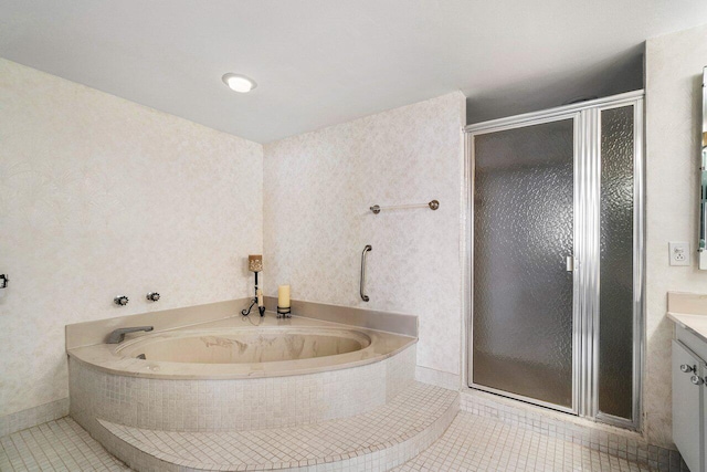 bathroom with tile patterned floors, vanity, and plus walk in shower