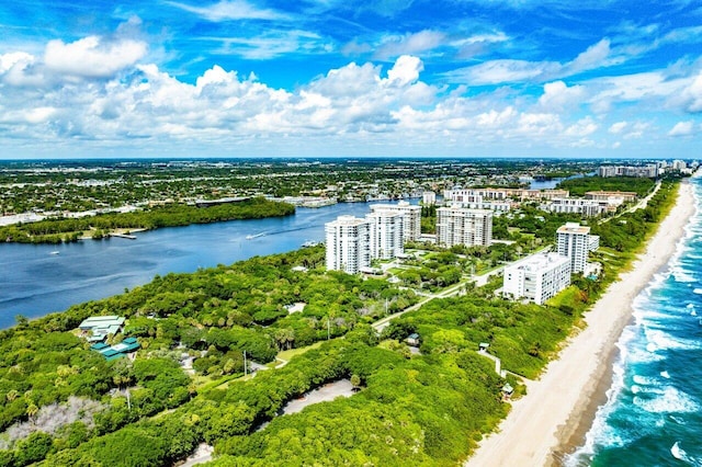 bird's eye view with a water view and a view of the beach