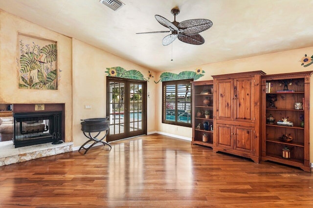 living room featuring french doors, hardwood / wood-style flooring, and ceiling fan