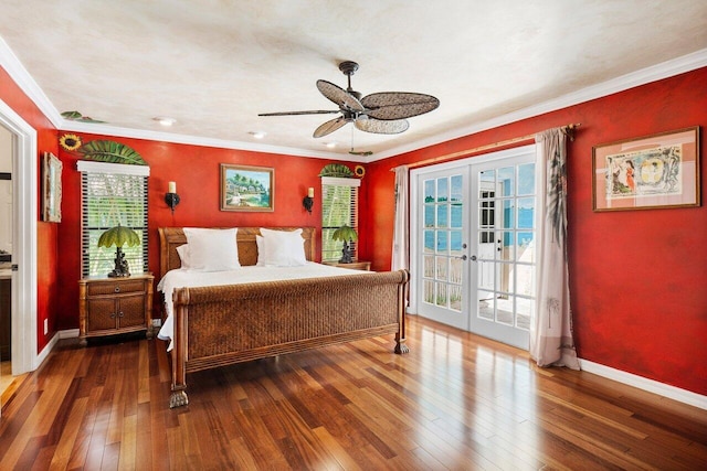 bedroom featuring multiple windows, ceiling fan, french doors, and dark wood-type flooring