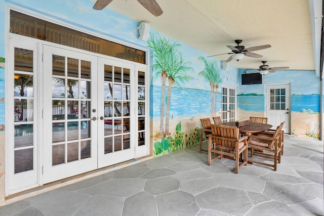 view of patio / terrace featuring ceiling fan and french doors