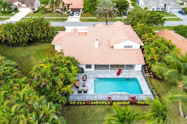 view of pool featuring a yard and a patio