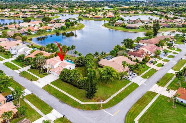 drone / aerial view featuring a water view