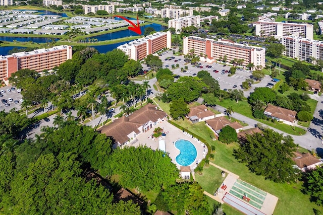 birds eye view of property featuring a water view