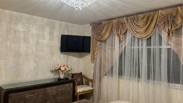bedroom with a textured ceiling