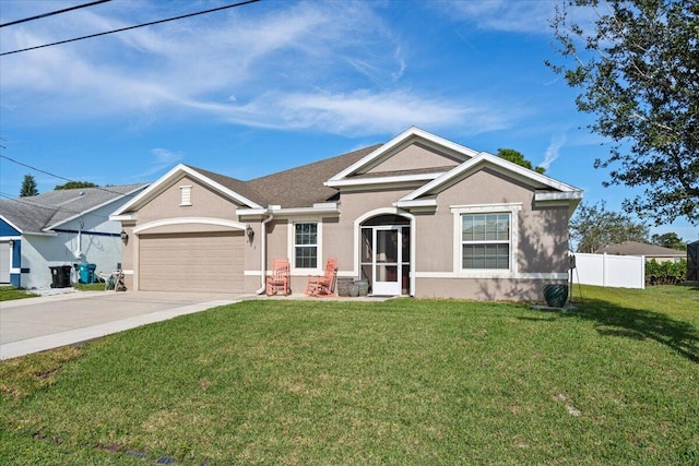 view of front facade featuring a front yard and a garage