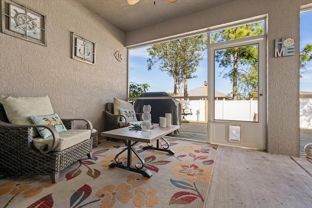 interior space featuring ceiling fan