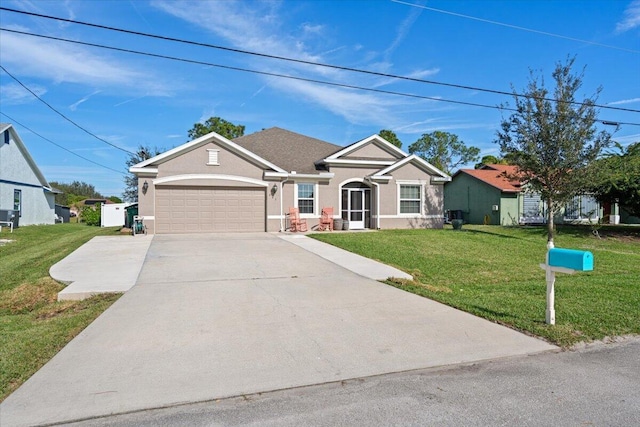 view of front facade with a front yard and a garage