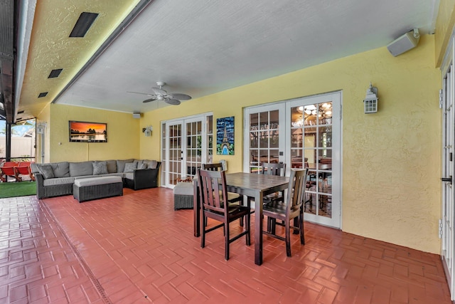 exterior space featuring outdoor lounge area, ceiling fan, and french doors