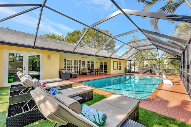 view of pool featuring french doors, an outdoor hangout area, a patio, and ceiling fan