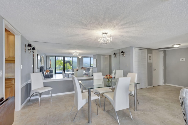 dining area with a notable chandelier