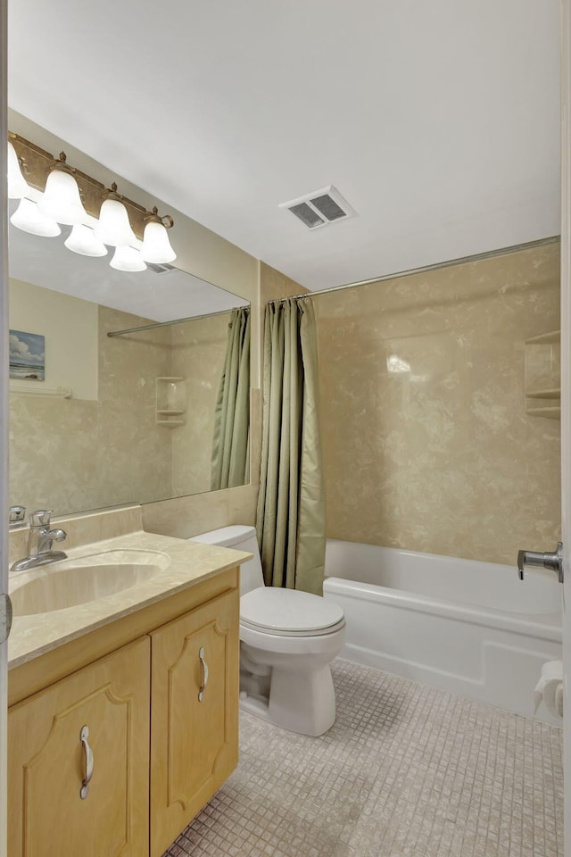 full bathroom with tile patterned flooring, vanity, toilet, and shower / bath combo with shower curtain