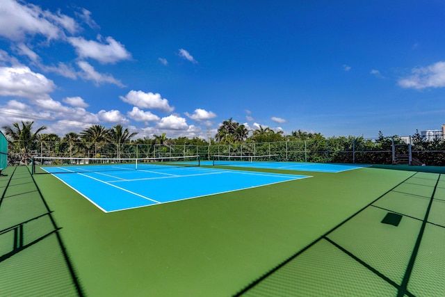 view of sport court featuring basketball hoop