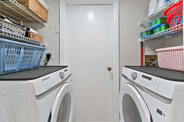 laundry room with washer and dryer