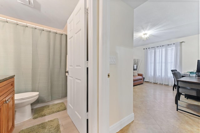 5272 Bolero Cir, Delray Beach, FL 33484 - full bath featuring tile patterned flooring, vanity, toilet, curtained shower, and baseboards