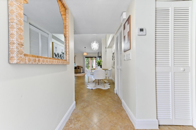 hallway with light tile patterned flooring