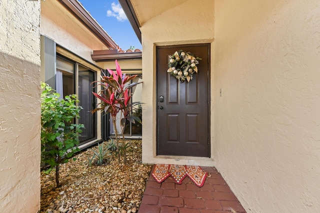 5272 Bolero Cir, Delray Beach, FL 33484 - view of exterior entry with stucco siding