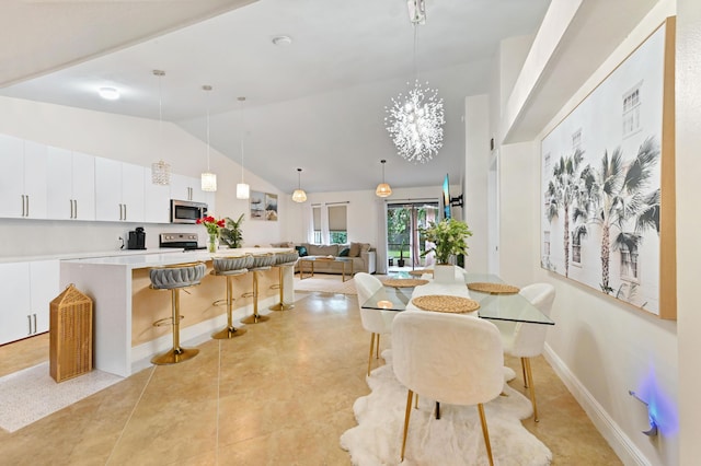 5272 Bolero Cir, Delray Beach, FL 33484 - dining area featuring lofted ceiling and a chandelier