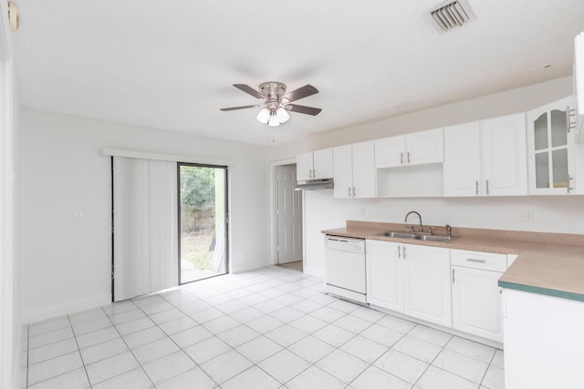 kitchen with white cabinetry, sink, ceiling fan, white dishwasher, and light tile patterned flooring