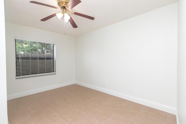 unfurnished room featuring ceiling fan