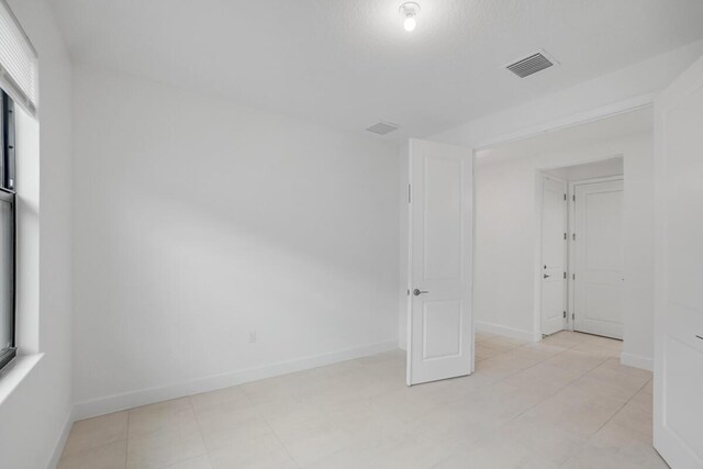 12535 SW Blue Mangrove Pkwy, Port Saint Lucie, FL 34987 - empty room featuring baseboards