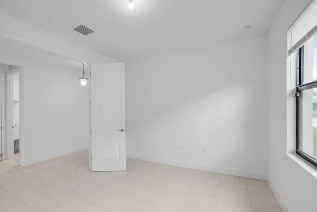 12535 SW Blue Mangrove Pkwy, Port Saint Lucie, FL 34987 - spare room with baseboards