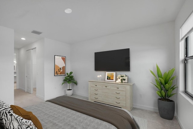 12535 SW Blue Mangrove Pkwy, Port Saint Lucie, FL 34987 - bedroom with light colored carpet, baseboards, and recessed lighting