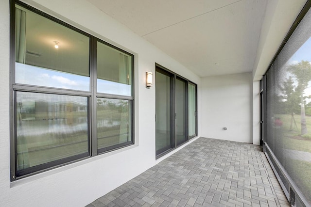 unfurnished sunroom with a healthy amount of sunlight