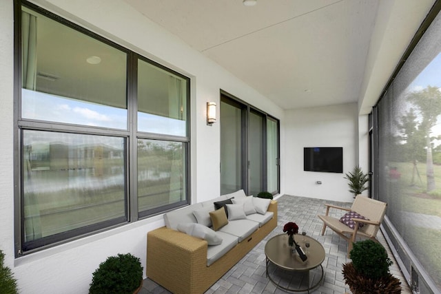 sunroom / solarium with a healthy amount of sunlight