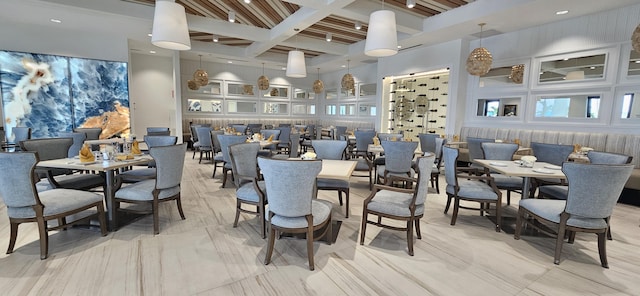 dining room with beamed ceiling