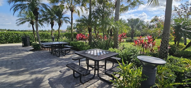 12535 SW Blue Mangrove Pkwy, Port Saint Lucie, FL 34987 - view of community with outdoor dining area and a patio