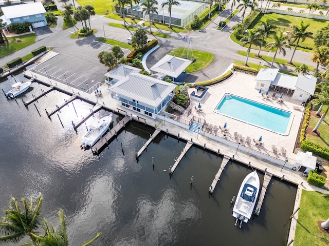 birds eye view of property featuring a water view