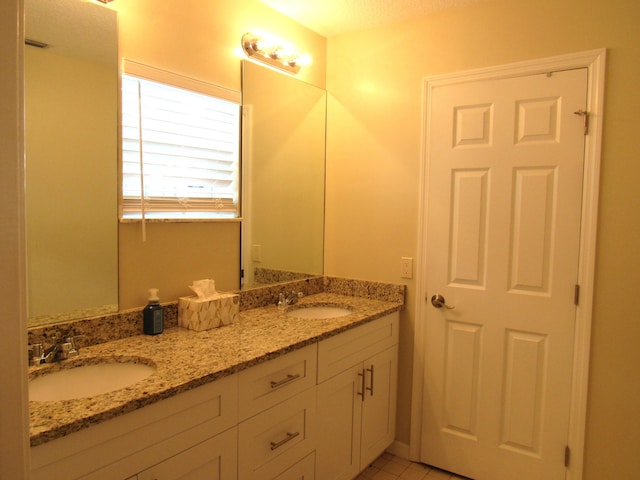 bathroom featuring vanity and tile patterned floors