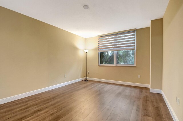 walk in closet featuring dark wood-type flooring