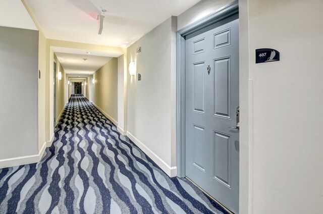 unfurnished room with light wood-type flooring and ceiling fan