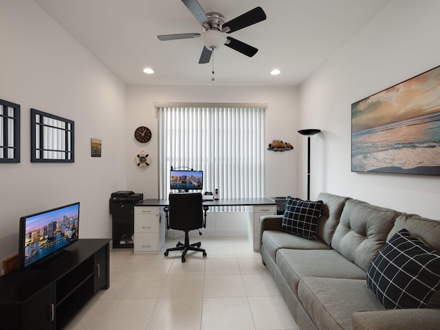 office space featuring ceiling fan and light tile patterned floors