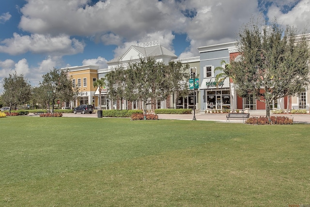 view of community featuring a yard