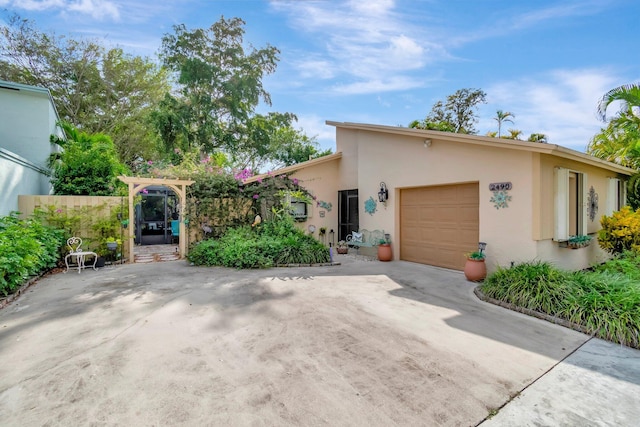 view of front of property featuring a garage