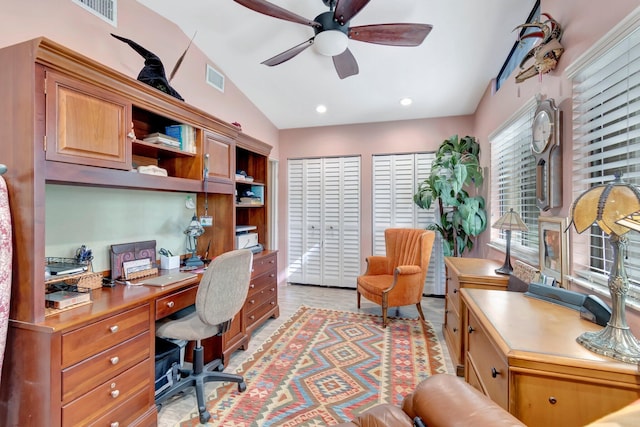 office space featuring ceiling fan and lofted ceiling