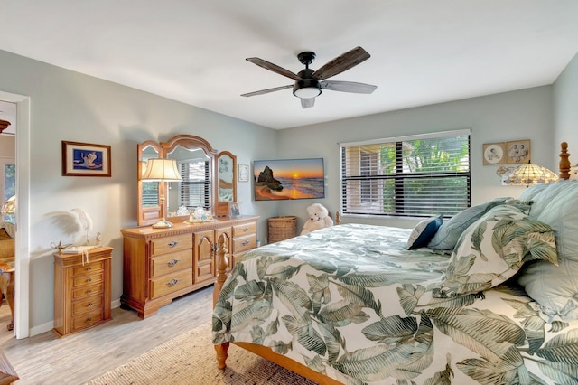 bedroom featuring light hardwood / wood-style flooring and ceiling fan