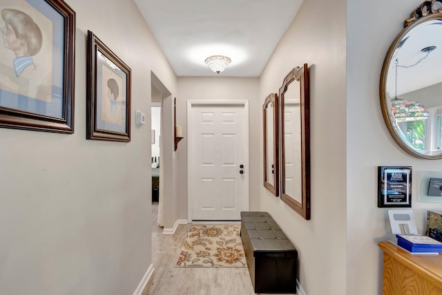 hallway with light wood-type flooring