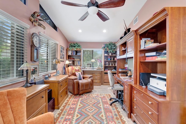 office area featuring ceiling fan and lofted ceiling