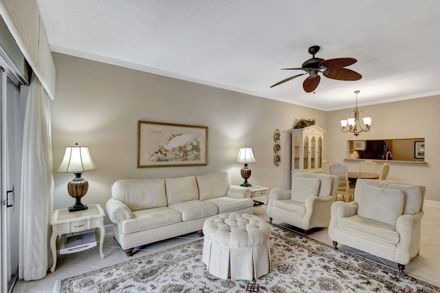 living room featuring tile patterned floors, a textured ceiling, ceiling fan with notable chandelier, and ornamental molding