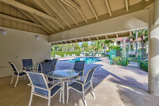 view of patio featuring a community pool