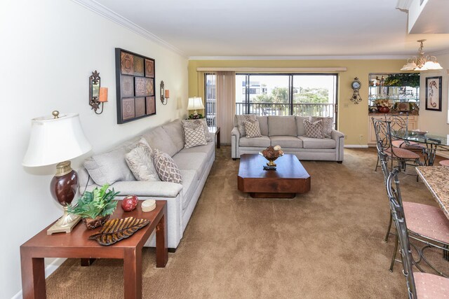 living room with crown molding, light colored carpet, and an inviting chandelier